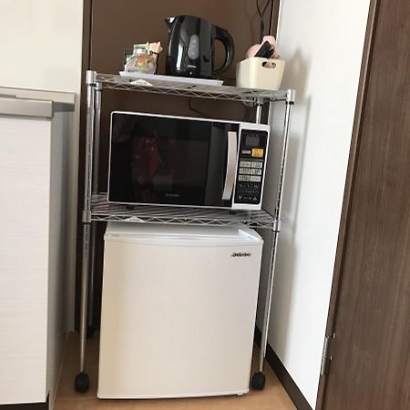 Tomiya Aparthotel Osaka Bagian luar foto