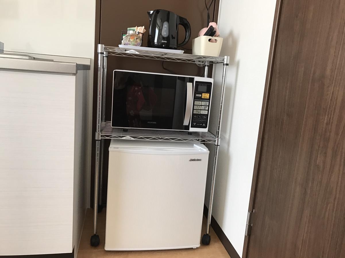 Tomiya Aparthotel Osaka Bagian luar foto